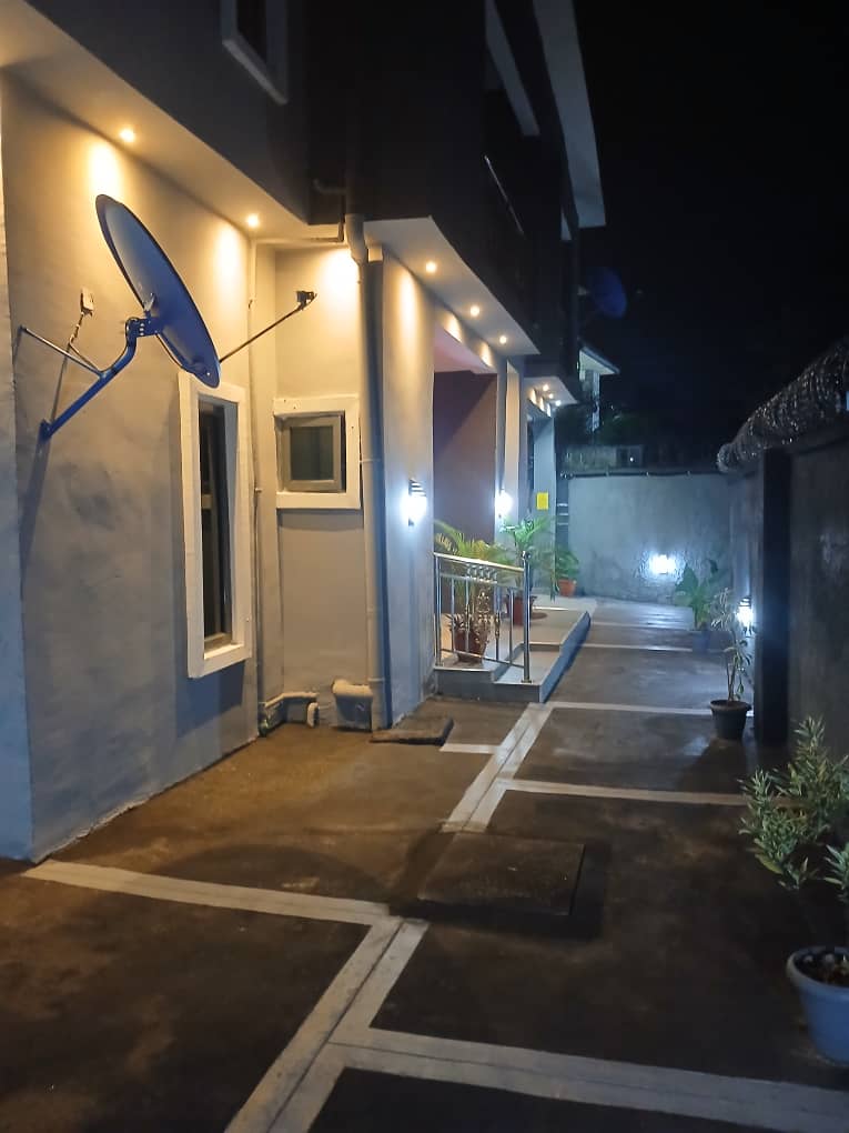 Building entrance walkway at night